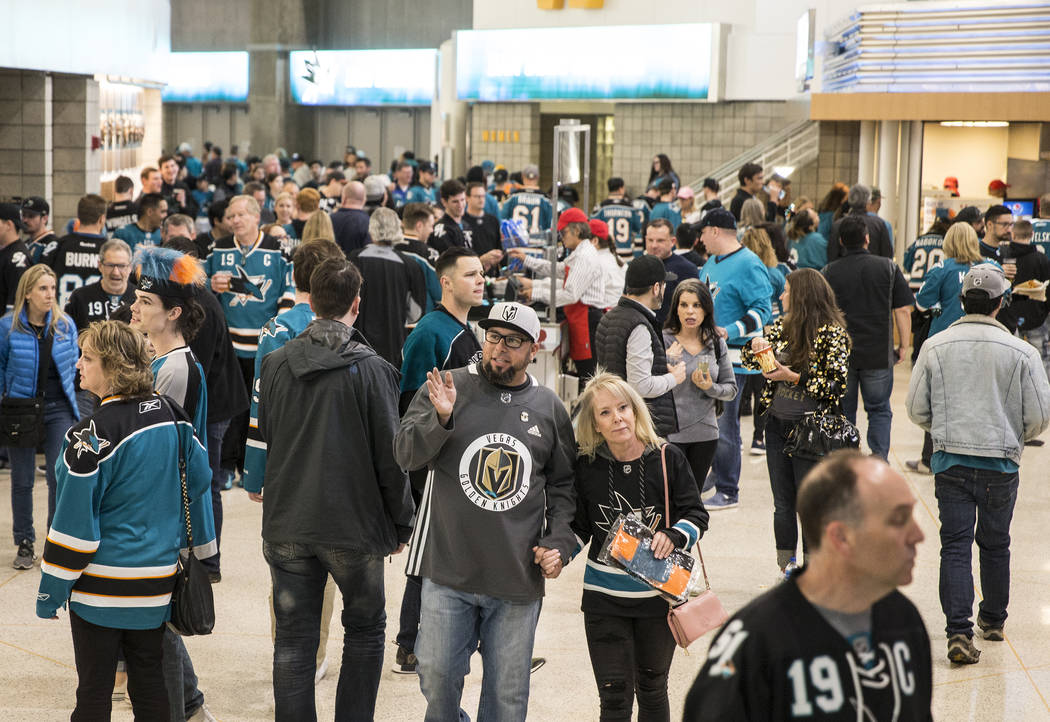 San Jose Sharks fans make their way to their seats before the start of Game 2 of an NHL Western ...