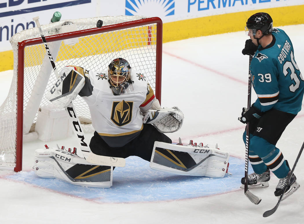 Golden Knights goaltender Marc-Andre Fleury (29) makes a save against San Jose Sharks center Lo ...