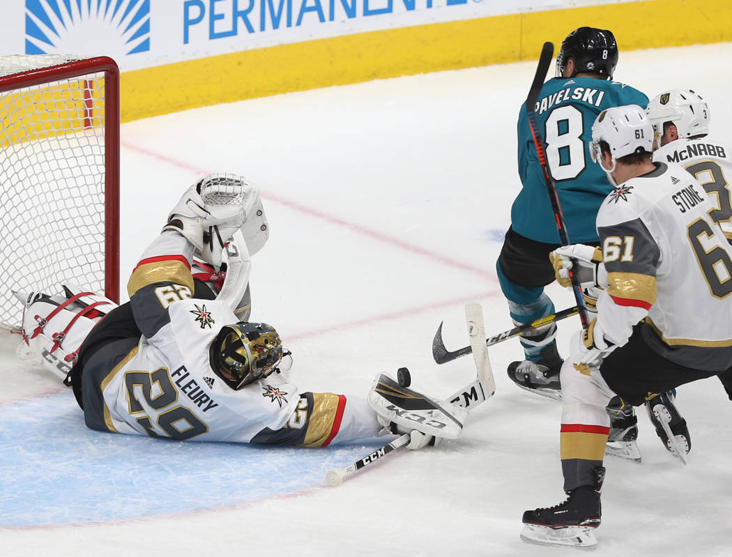 Golden Knights goaltender Marc-Andre Fleury (29) makes a save against San Jose Sharks center Jo ...