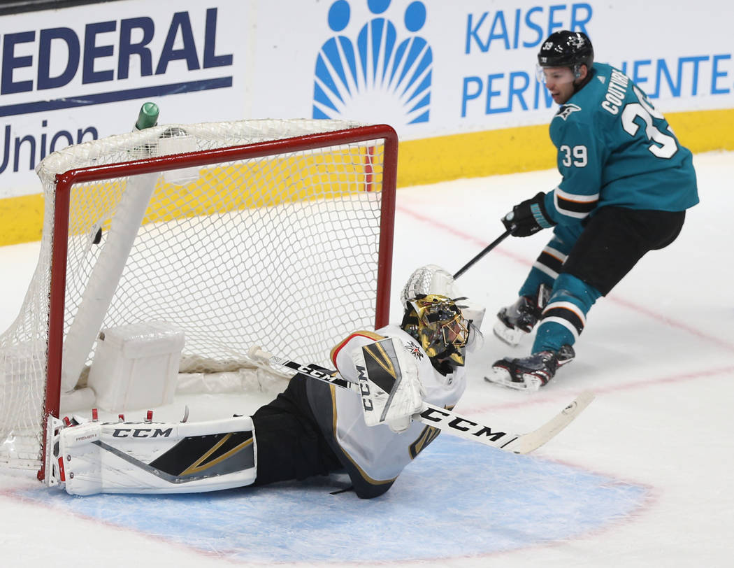 San Jose Sharks center Logan Couture (39) scores against Golden Knights goaltender Marc-Andre F ...