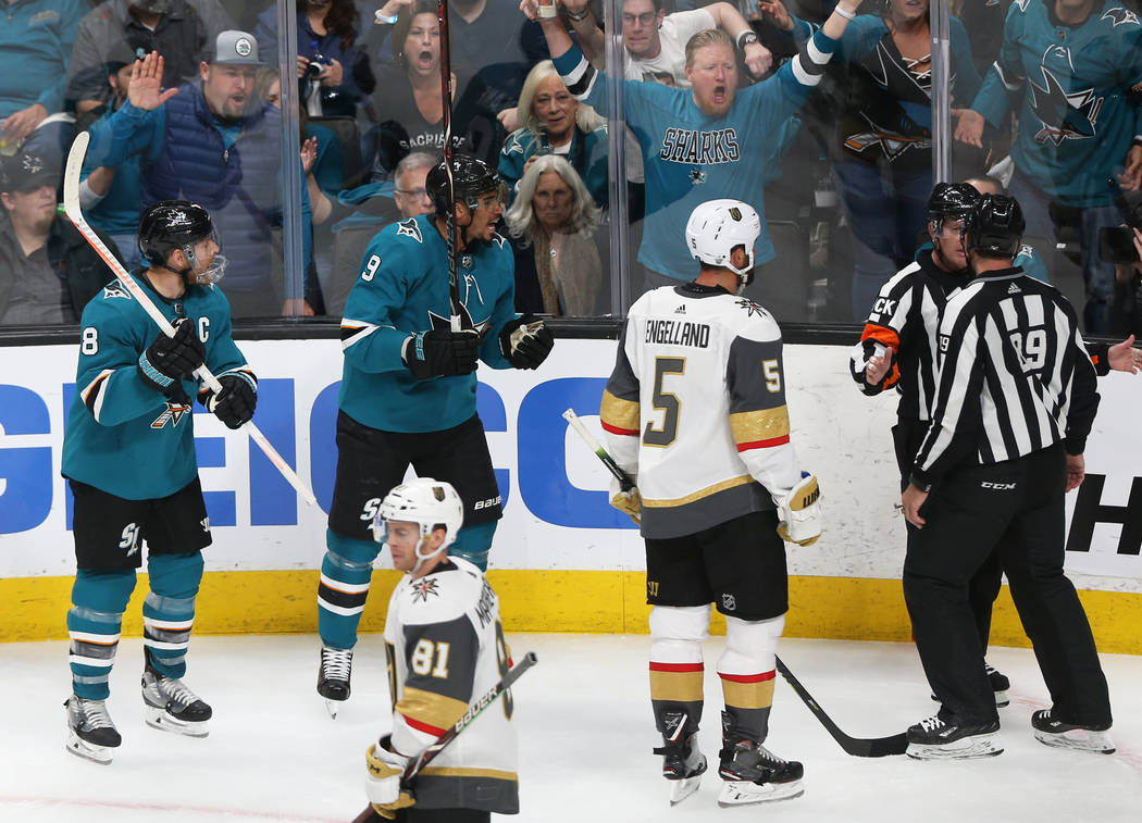 San Jose Sharks left wing Evander Kane (9), center Joe Pavelski (8) and Golden Knights defensem ...