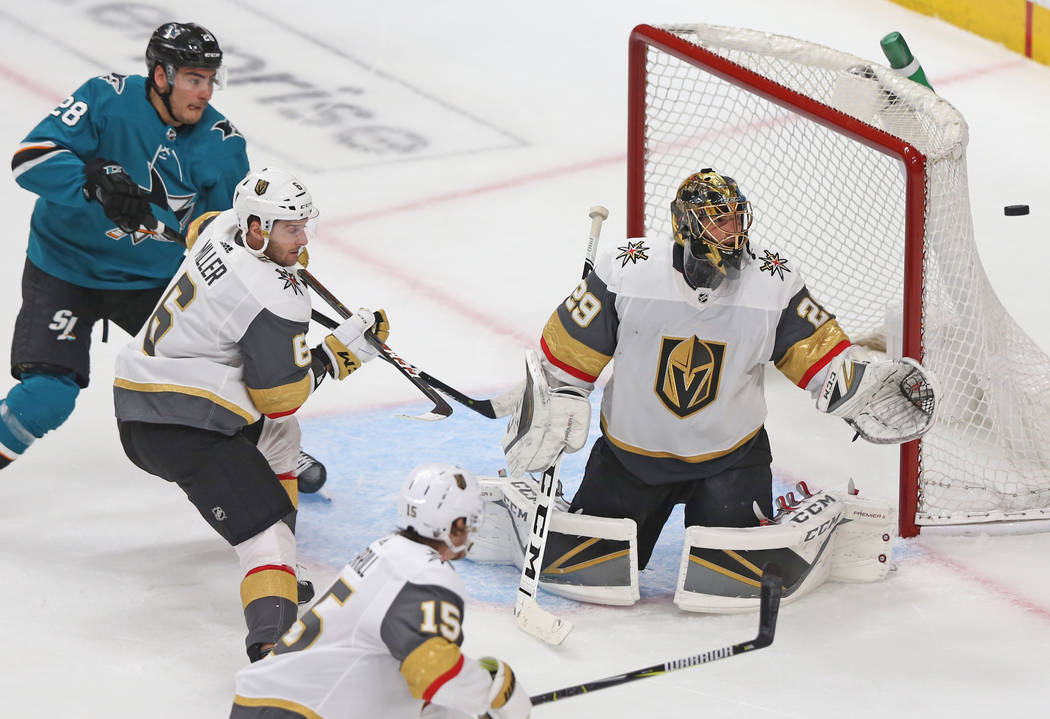 Golden Knights goaltender Marc-Andre Fleury (29) makes a save against San Jose Sharks right win ...