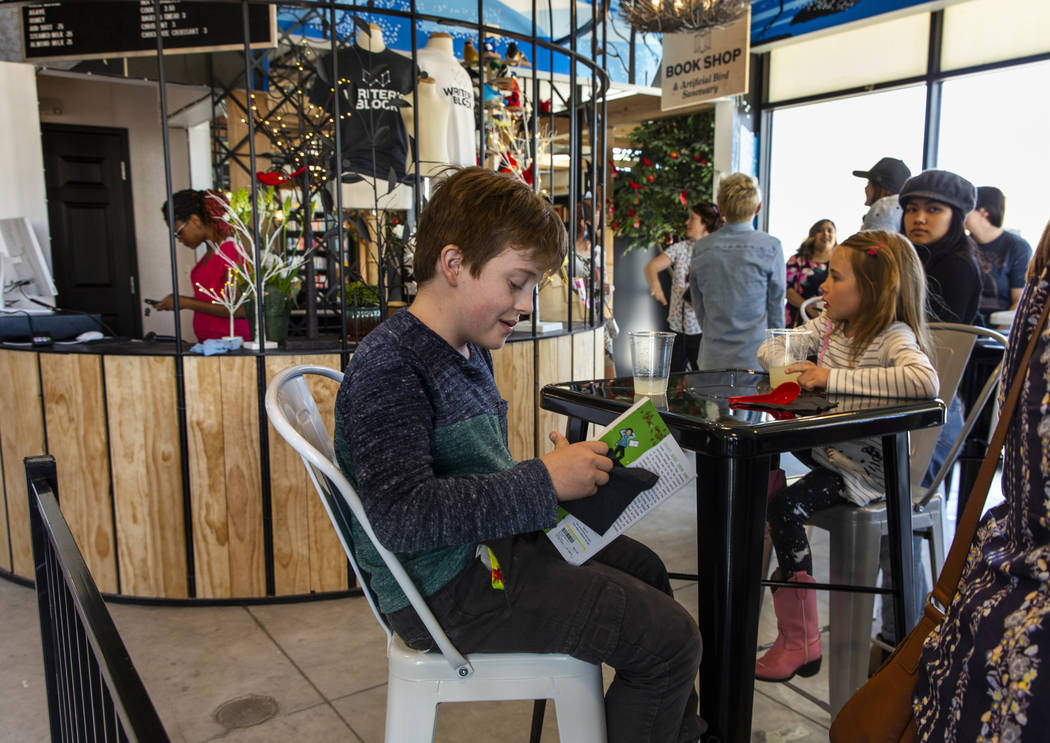 Nigel Henderson, 9, and sister Greta, 7, enjoy the new coffee shop during the launch of The Luc ...