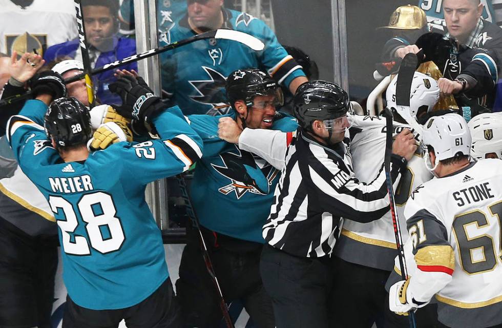 San Jose Sharks right wing Timo Meier (28) and left wing Evander Kane (9) fight with Golden Kni ...