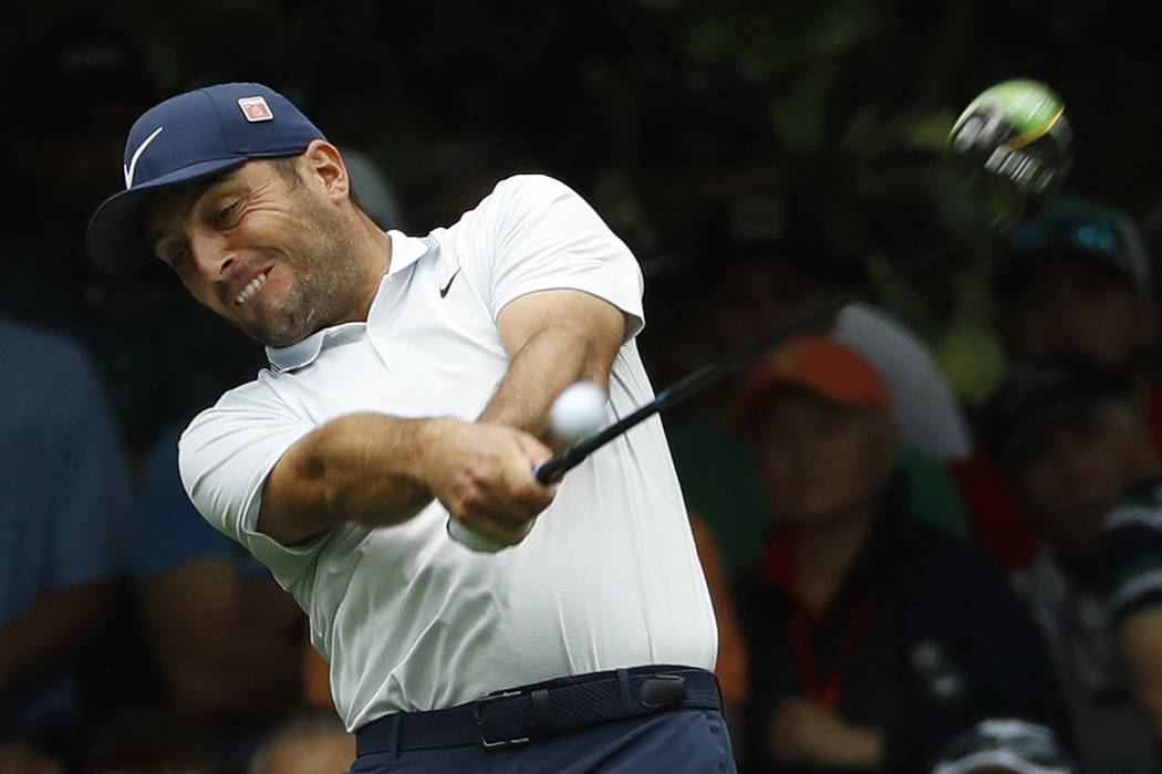 Francesco Molinari, of Italy, hits a drive on the seventh hole during the final round for the M ...