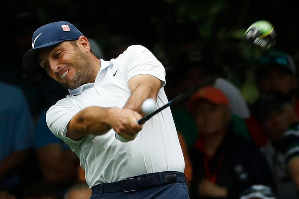 Francesco Molinari, of Italy, hits a drive on the seventh hole during the final round for the M ...