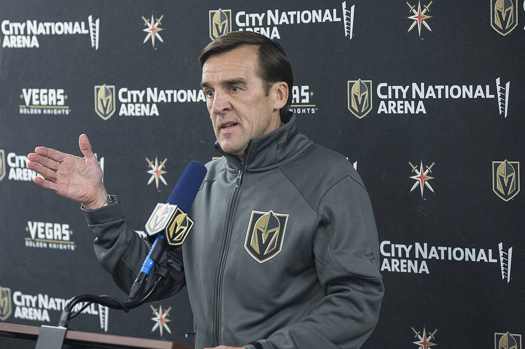 Golden Knights general manager George McPhee takes questions during a press conference after pr ...