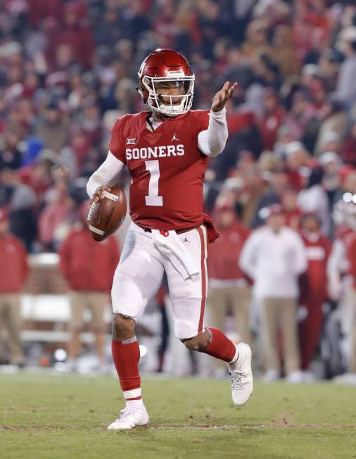 Oklahoma quarterback Kyler Murray (1) gestures to his team during a play against Kansas during ...