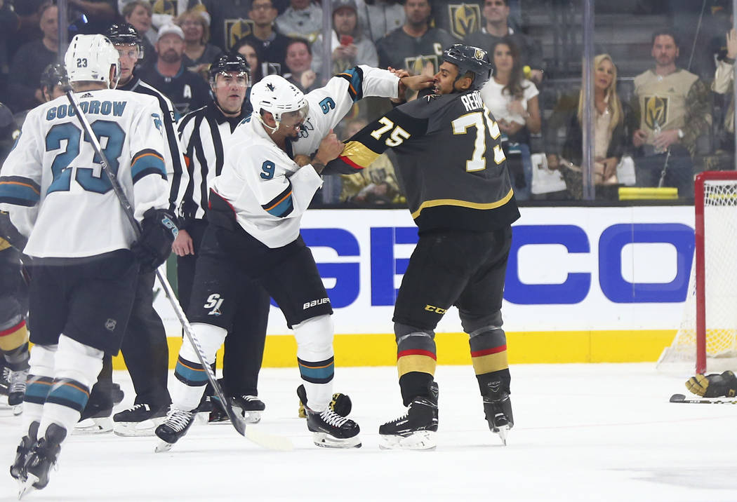 Golden Knights right wing Ryan Reaves (75) fights San Jose Sharks left wing Evander Kane (9) du ...