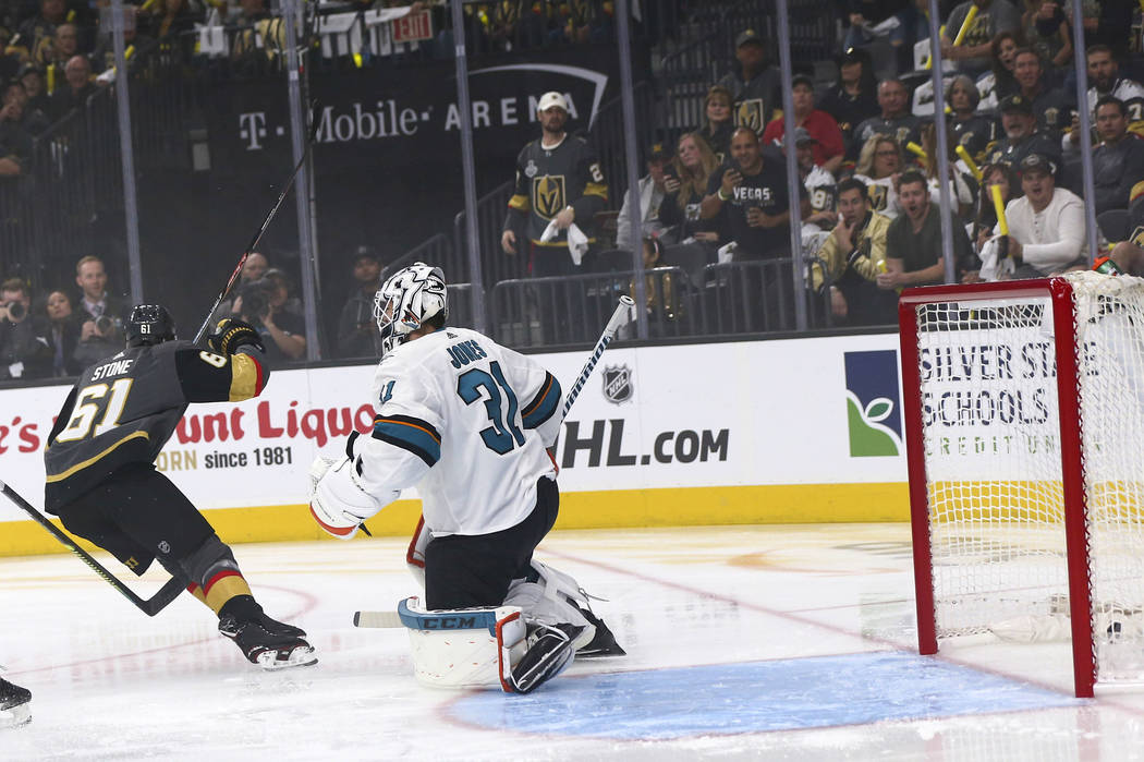 Golden Knights right wing Mark Stone (61) scores a goal past San Jose Sharks goaltender Martin ...