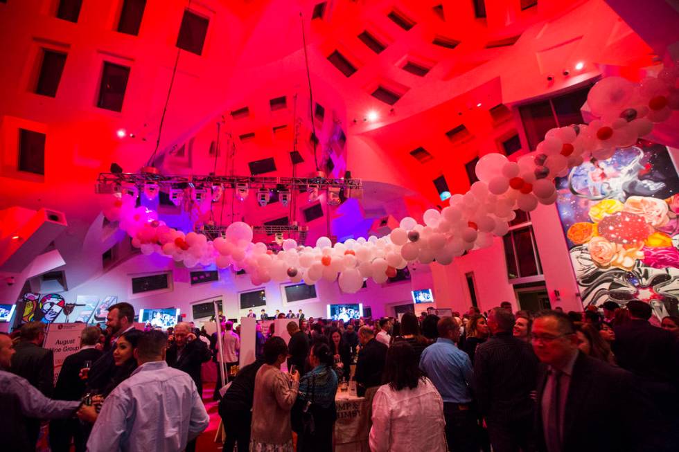 Attendees roam during Bubble-Licious, the UNLVino kickoff event, at the Keep Memory Alive Event ...