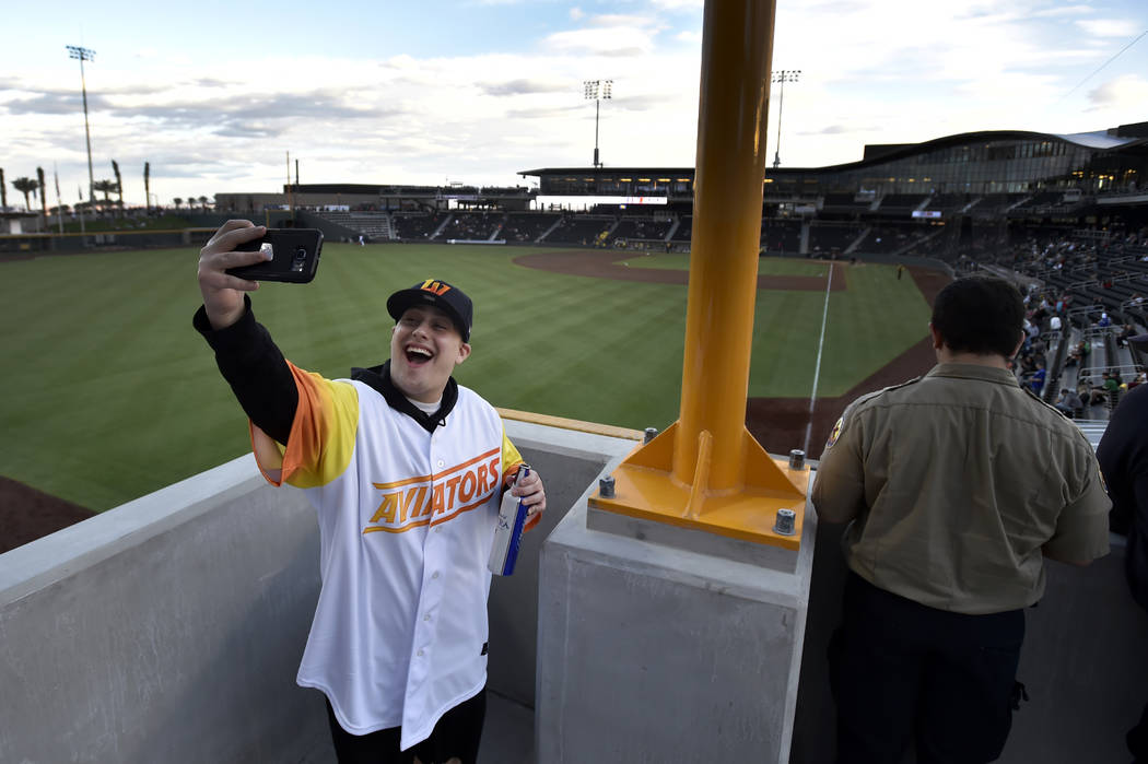 Joel Rihaly of Las Vegas takes a selfie from left field before the Las Vegas Aviators play the ...