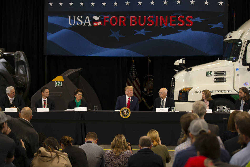 President Donald Trump speaks at Nuss Truck and Equipment Monday, April 15, 2019, in Burnsville ...