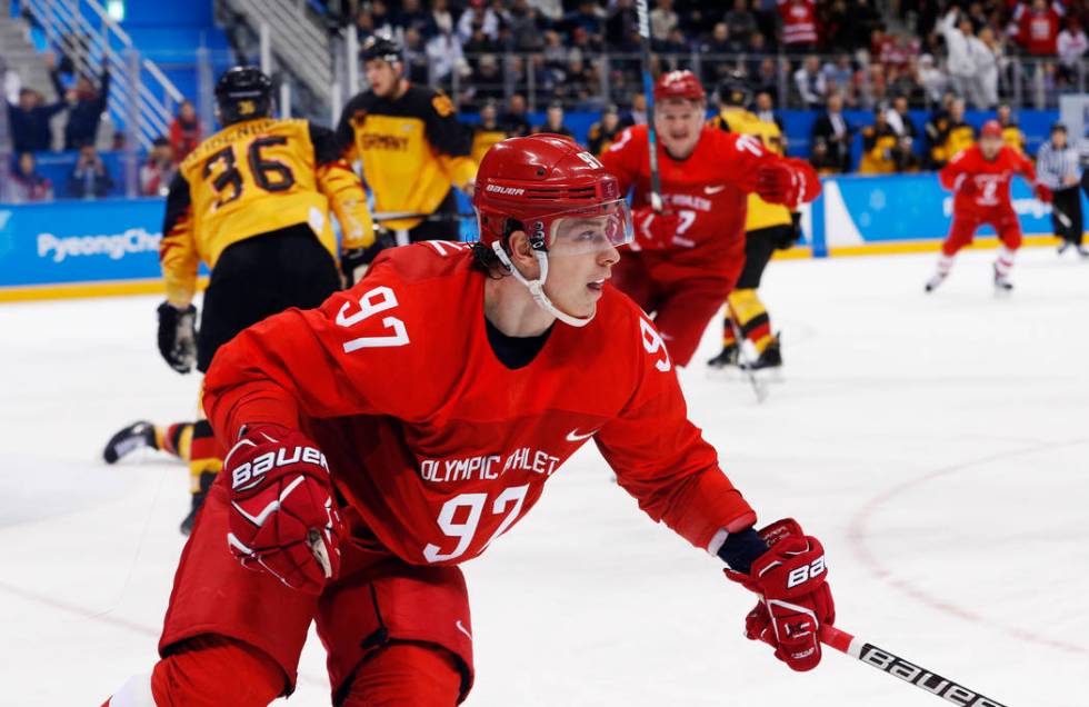 Russian athlete Nikita Gusev (97) reacts after scoring a goal during the third period of the me ...