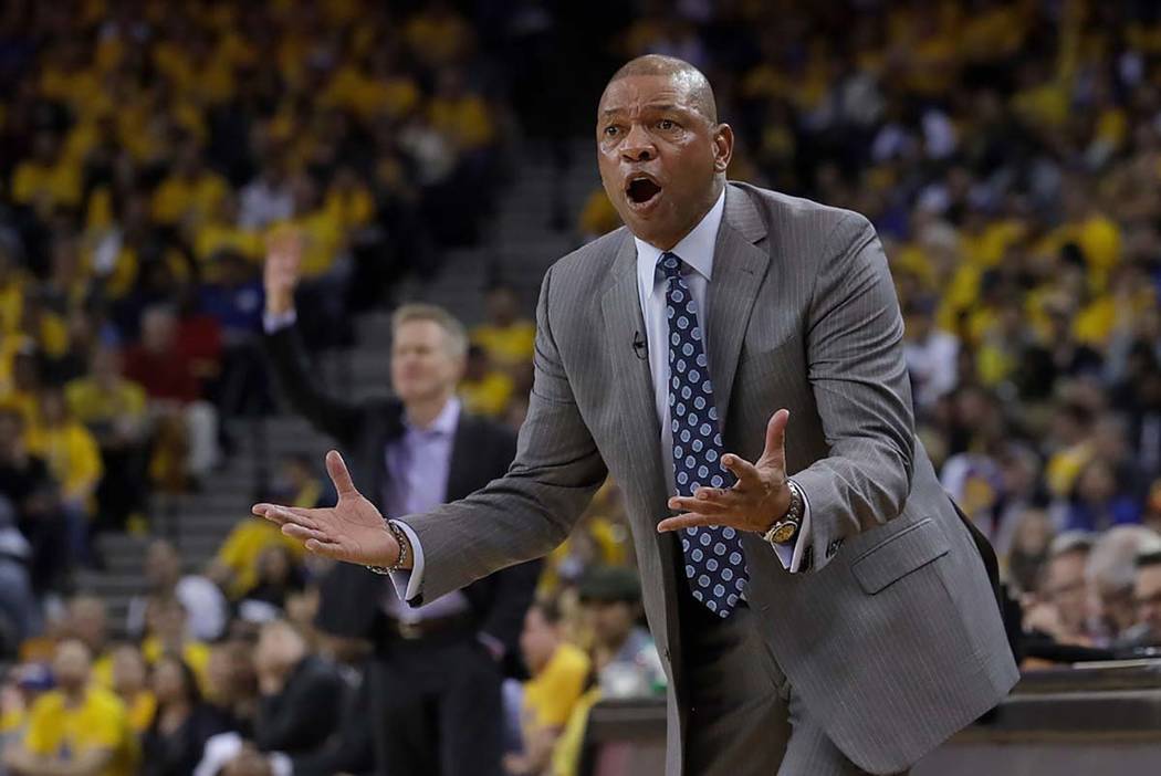 Los Angeles Clippers head coach Doc Rivers gestures toward an official during the first half of ...