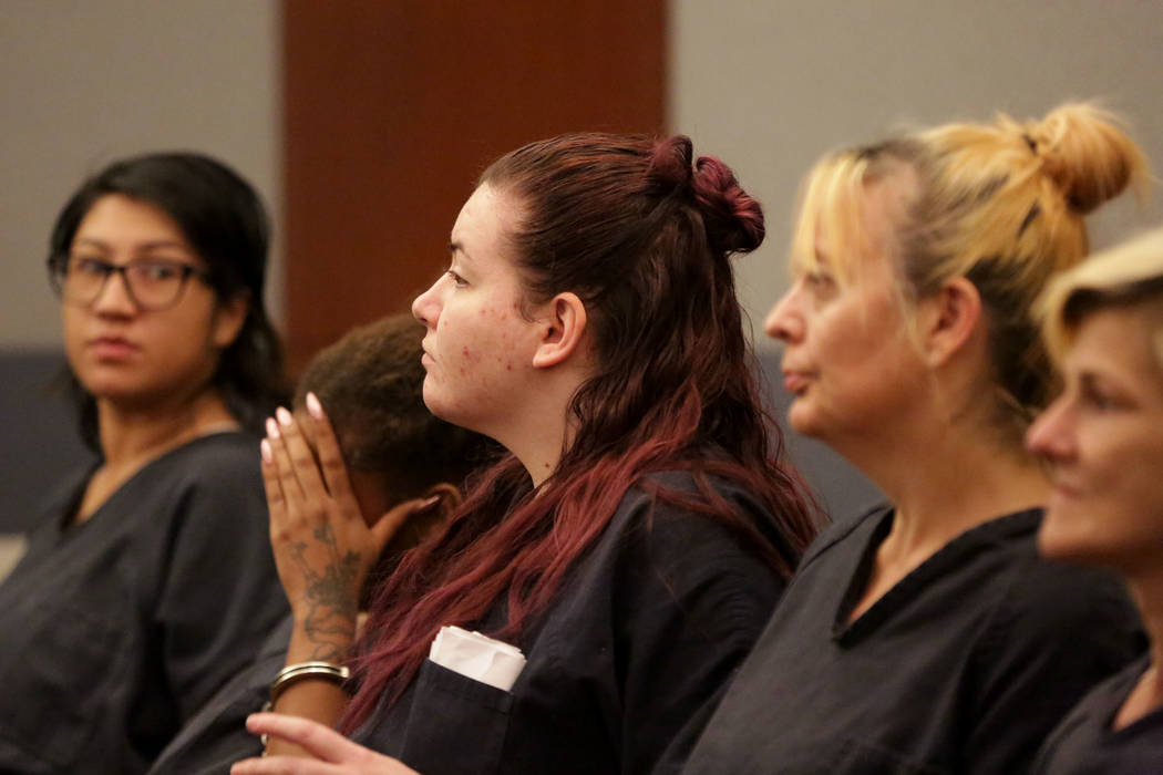 Diana Pena, center, one of three suspects in the killing of a California doctor appears in cour ...