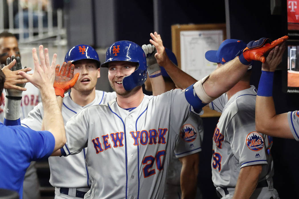 New York Mets' Pete Alonso (20) celebrates after hitting a two-run home run during the seventh ...