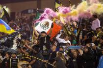 Las Vegas Lights FC fans cheer at the start of a United Soccer League match against the Austin ...