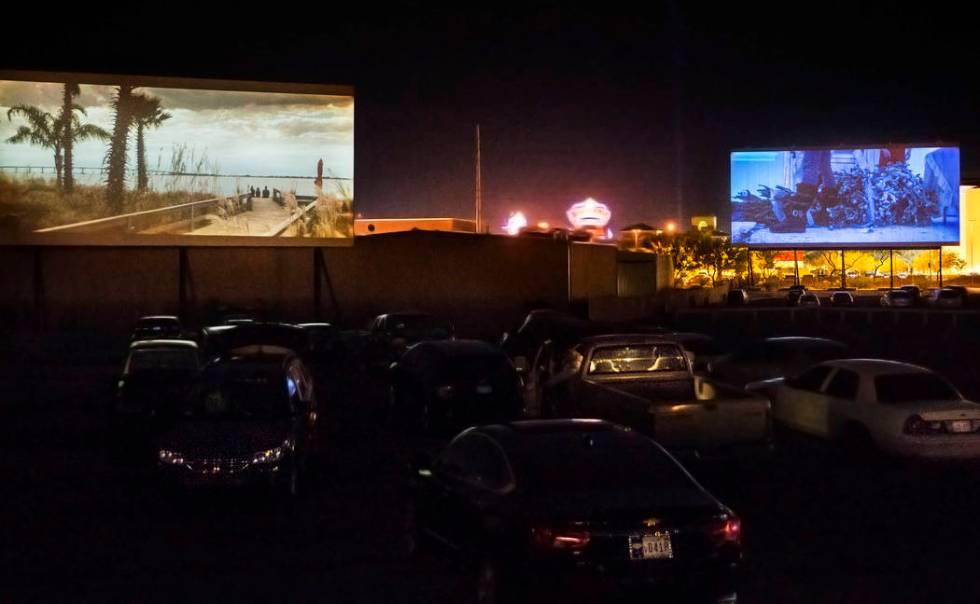 Patrons watch Geostorm, left, and Bad Moms Christmas at the Las Vegas Drive In on Sunday, Nov. ...