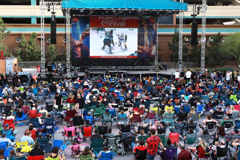 Fans attend a Vegas Golden Knights watch party for game six of the Stanley Cup playoffs outside ...