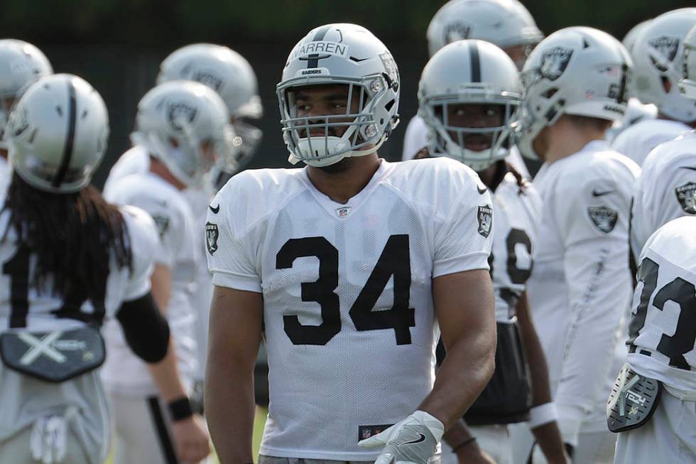 Oakland Raiders' Chris Warren III (34) during NFL football practice in Napa, Calif., Wednesday, ...