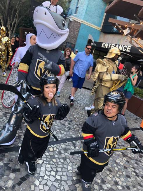 Brian Thomas, Lorren Cackowski and the shark from Shark Reef at Mandalay Bay are shown at New Y ...