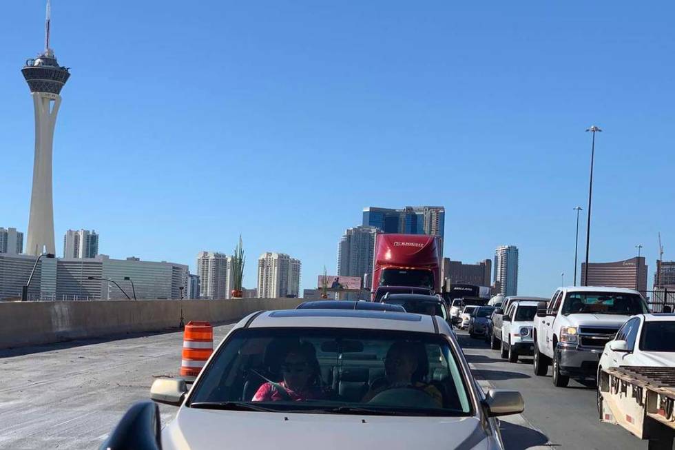 A semitrailer stopped in the middle of Interstate 15 near Charleston Boulevard has slowed traff ...