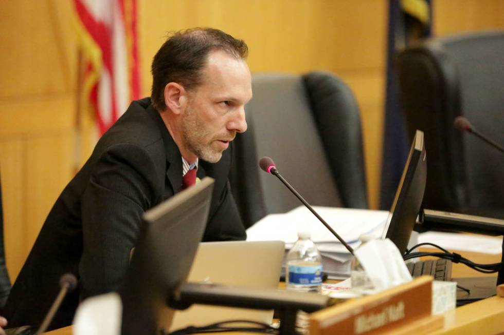 Clark County Commissioner Justin Jones addresses a speaker during a hearing on a proposal to bu ...