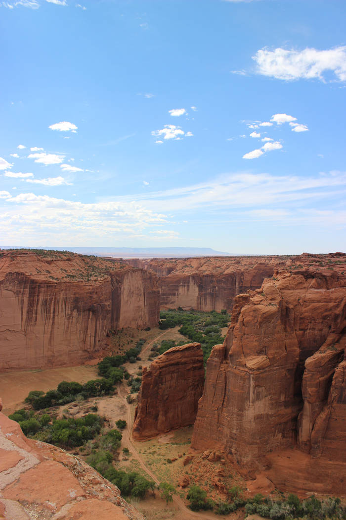 Red sandstone cliffs rise 1,000 feet from the valley floor in Canyon de Chelly. (Deborah Wall/L ...