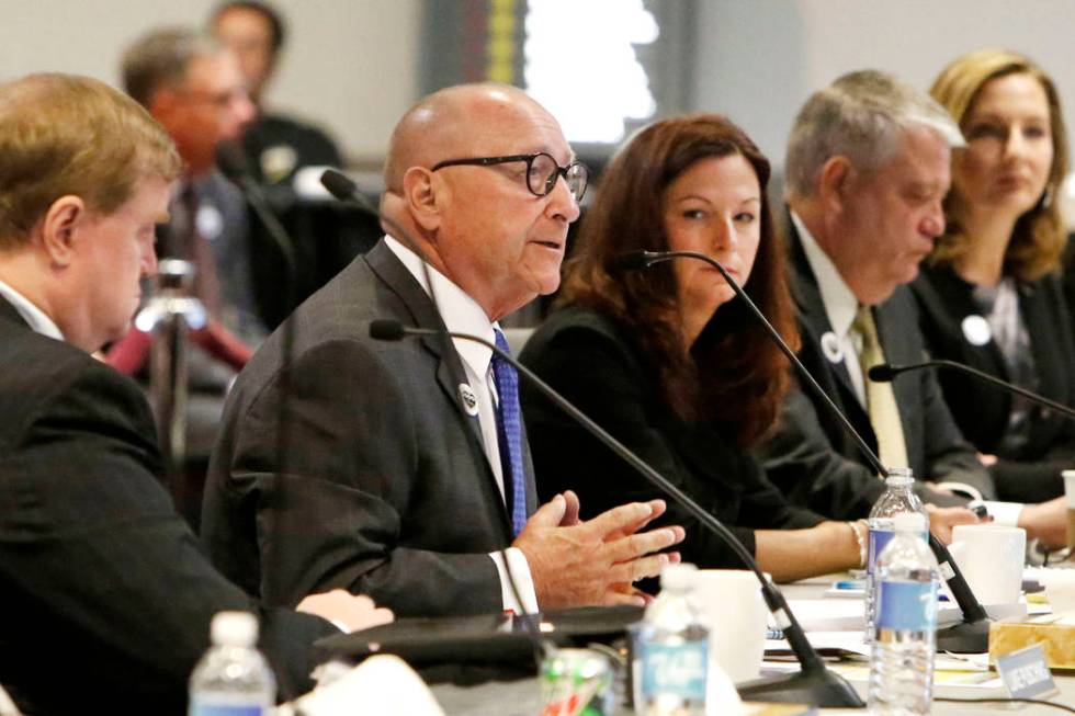 Rossi Ralenkotter, second left, then-president and CEO of the Las Vegas Convention and Visitors ...