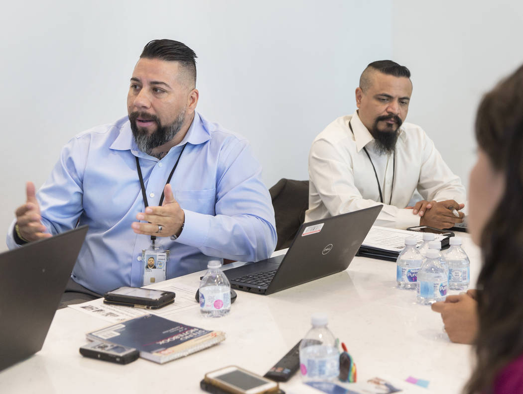 U.S. Department of Commerce partnership specialist Jorge Rangel, left, discusses the 2020 censu ...