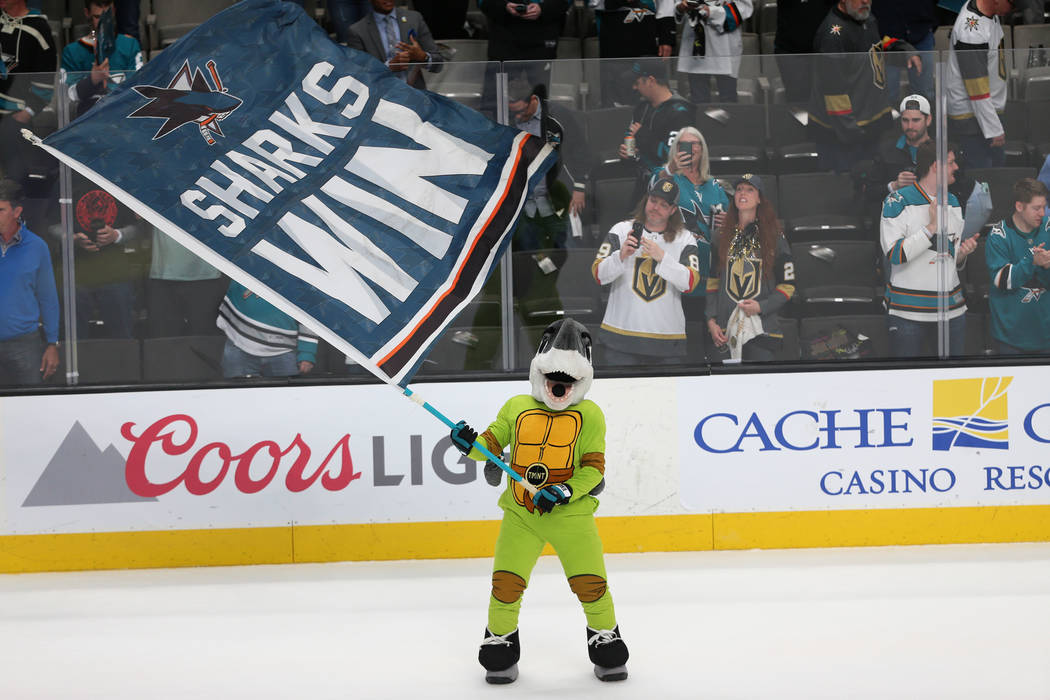 The San Jose Sharks mascot, S.J. Sharkie, celebrates the team's win 5-2 against the Vegas Golde ...