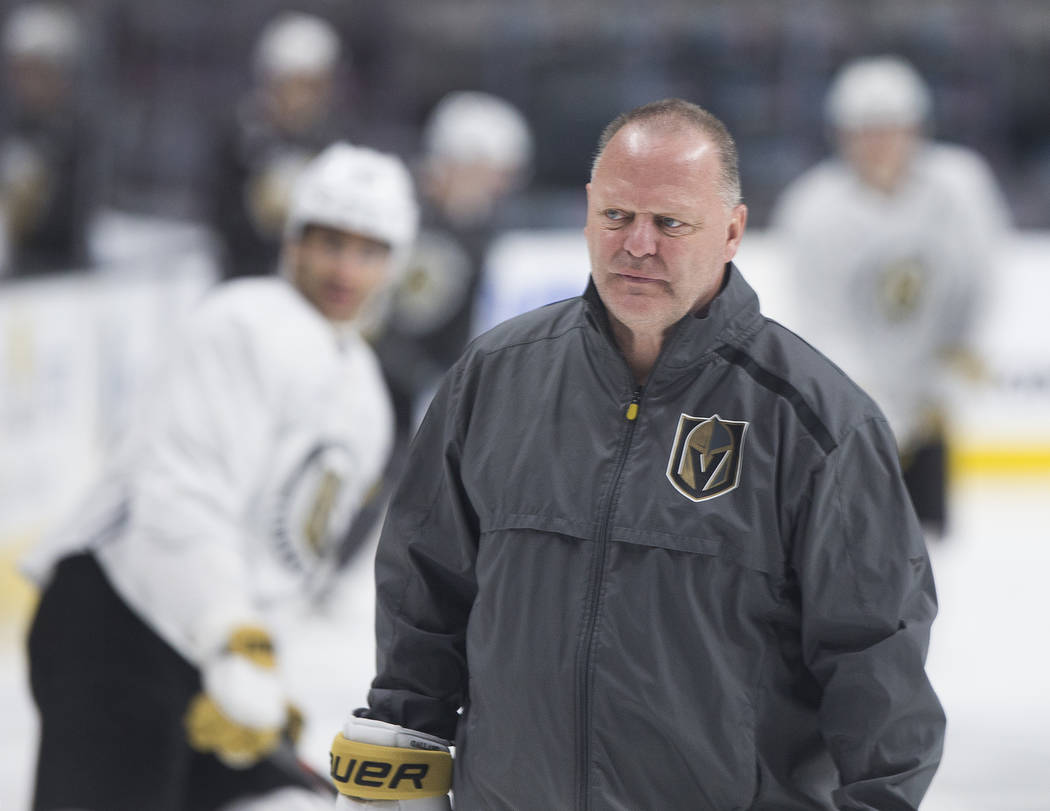 Golden Knights head coach Gerard Gallant warms up with his team during morning skate on Friday, ...