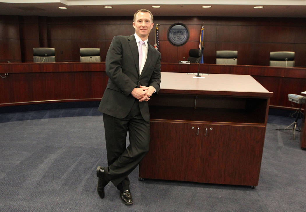 A.G. Burnett, chairman of the Nevada Gaming Board Commission, poses for a photo in the commissi ...