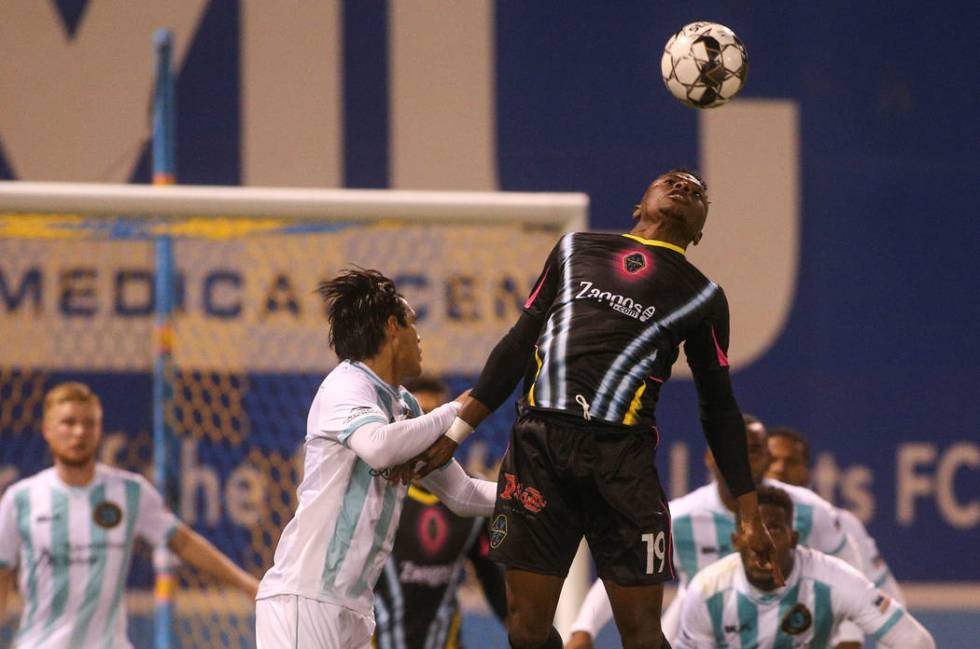 Las Vegas Lights FC forward Tabort Etaka Preston (19) jumps up to head the ball during the seco ...