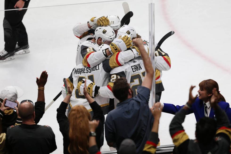 Vegas Golden Knights celebrate a score by center Jonathan Marchessault (81) during the third pe ...