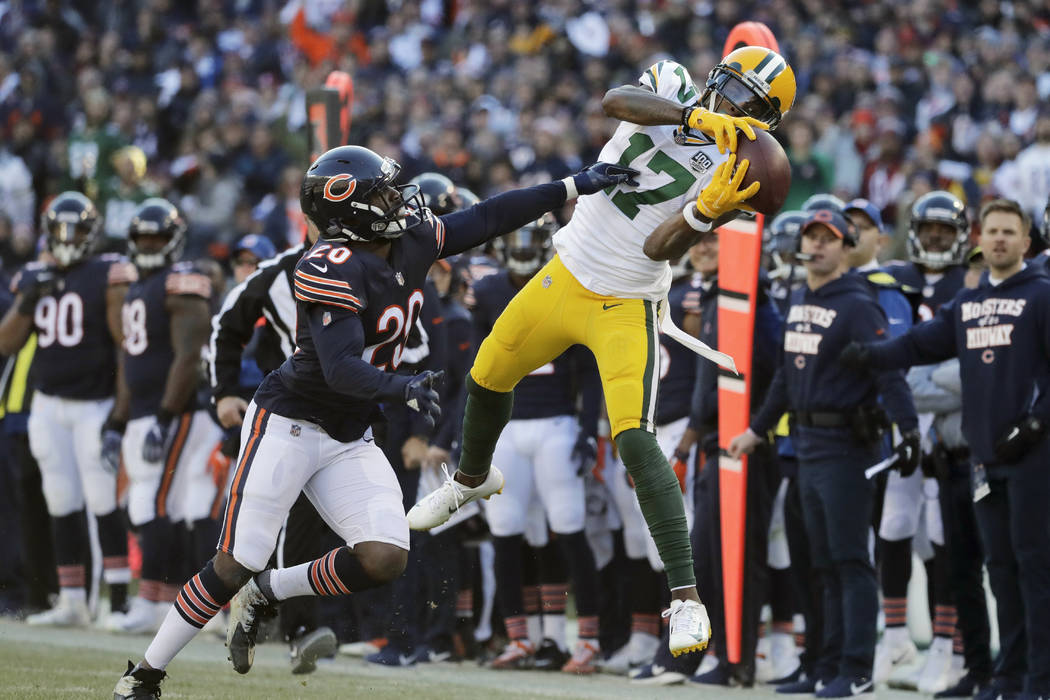 Green Bay Packers wide receiver Davante Adams (17) makes a catch against Chicago Bears cornerba ...