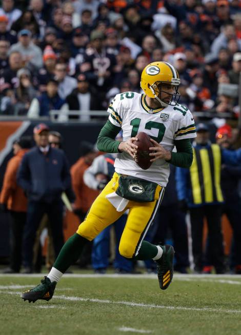 Green Bay Packers quarterback Aaron Rodgers (12) plays against the Chicago Bears during the fir ...