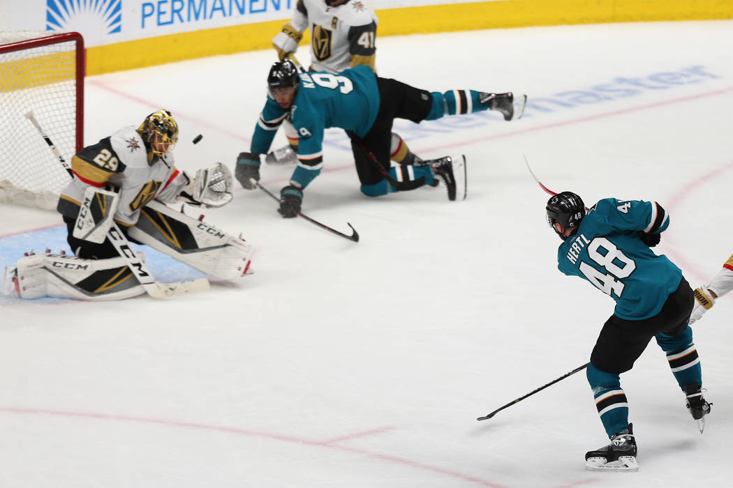 Vegas Golden Knights goaltender Marc-Andre Fleury (29) blocks a shot by San Jose Sharks center ...