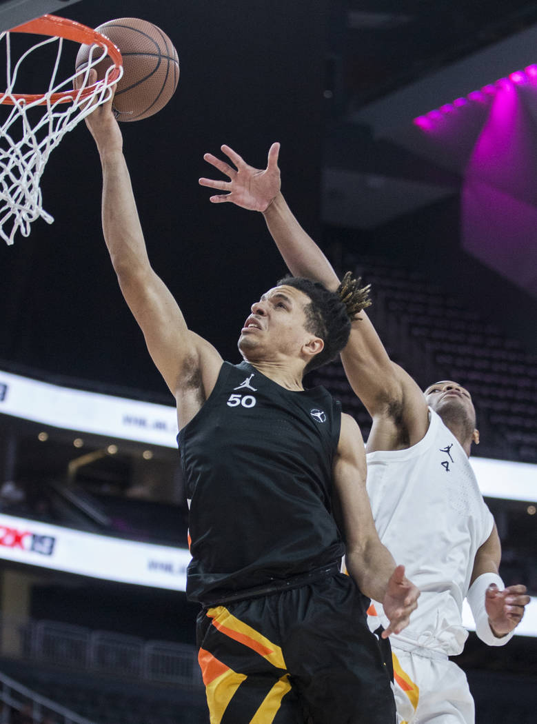 Cole Anthony (50) slices to the rim past Cassius Stanley (4) in the first half during the Jorda ...