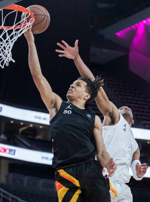 Cole Anthony (50) slices to the rim past Cassius Stanley (4) in the first half during the Jorda ...