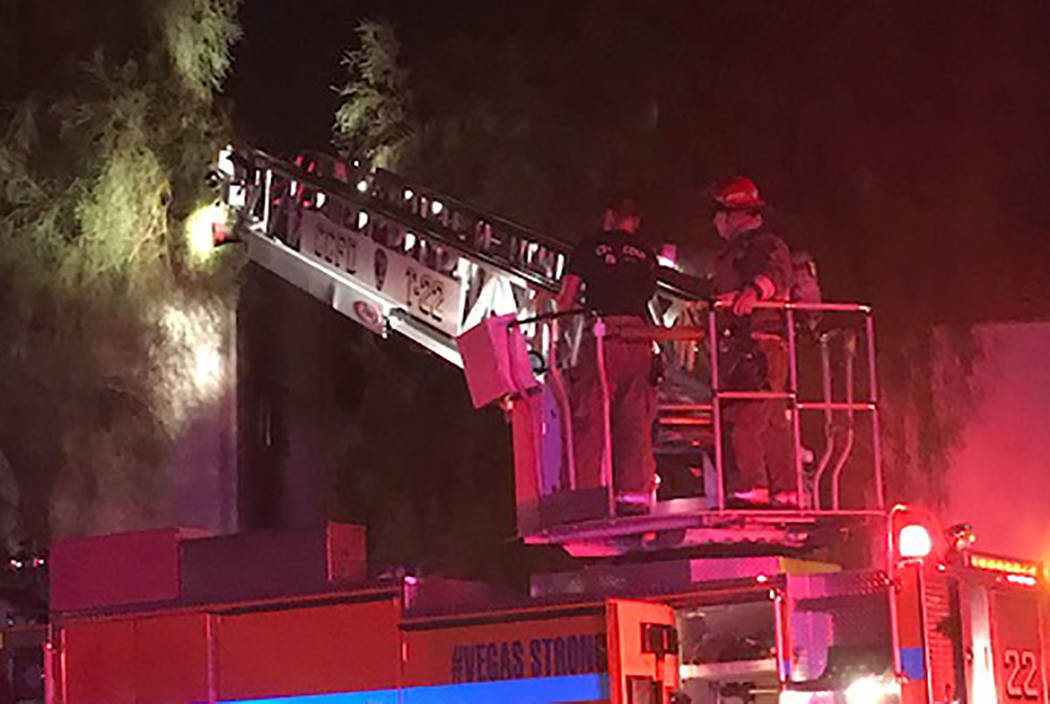 Firefighters battle a blaze at 3231 Jericho St. in Las Vegas on Saturday, April 20, 2019. (Clar ...