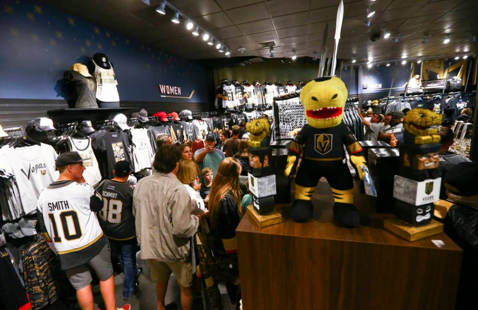 Golden Knights fans shop at the Armory before the start of Game 6 of an NHL Western Conference ...
