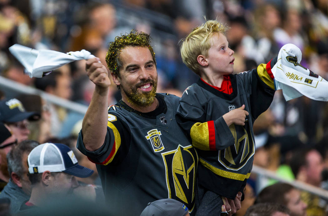 Golden Knights fans wave their "battle towels" during the first period of Game 6 of a ...