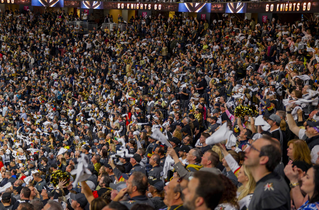 Golden Knights fans wave their "battle towels" during the second overtime period of G ...