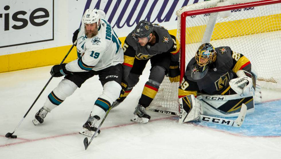 /s19 attempts to turn the corner for a shot over Golden Knights defenseman Jon Merrill (15) an ...