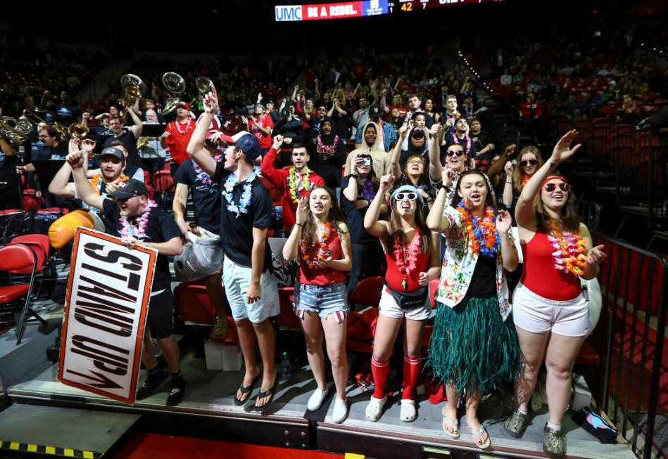 UNLV Rebels fans in the student section cheer during the second half of a basketball game again ...