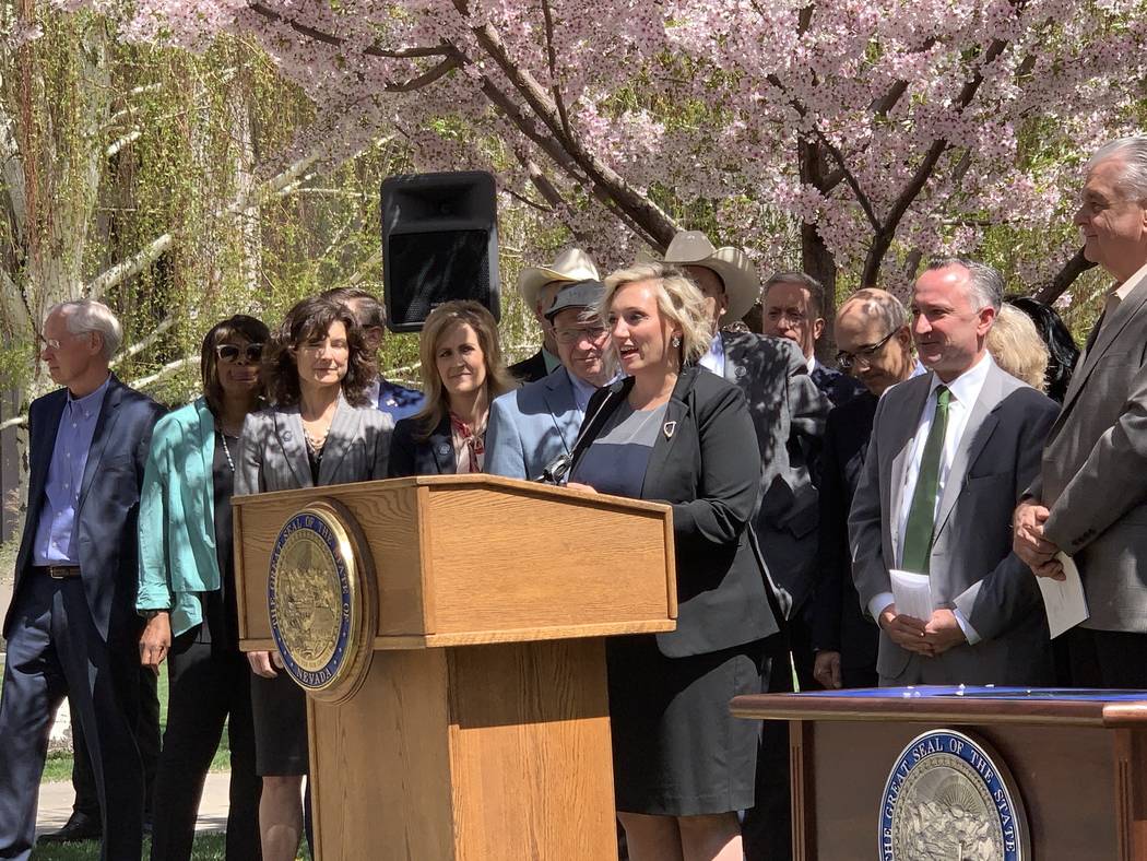 Senate Majority Leader Nicole Cannizzaro, D-Las Vegas, speaks at the signing Senate Bill 358, c ...