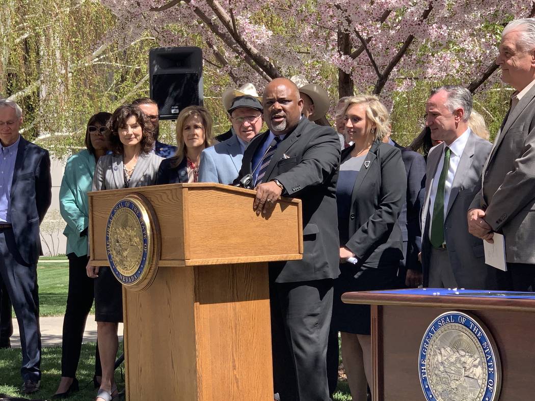 Assembly Speaker Jason Frierson, D-Las Vegas, speaks at the signing Senate Bill 358, committin ...