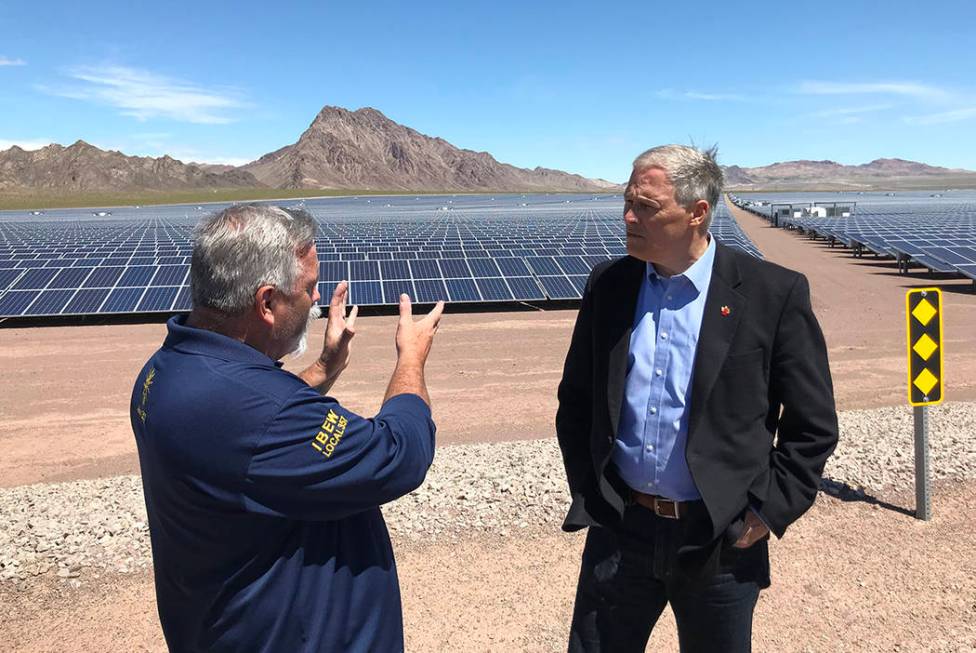 Max Carter, left, assistant business manager of the International Brotherhood of Electrical Wor ...